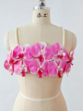 Women's pink 3D orchid pearl strap crop top.